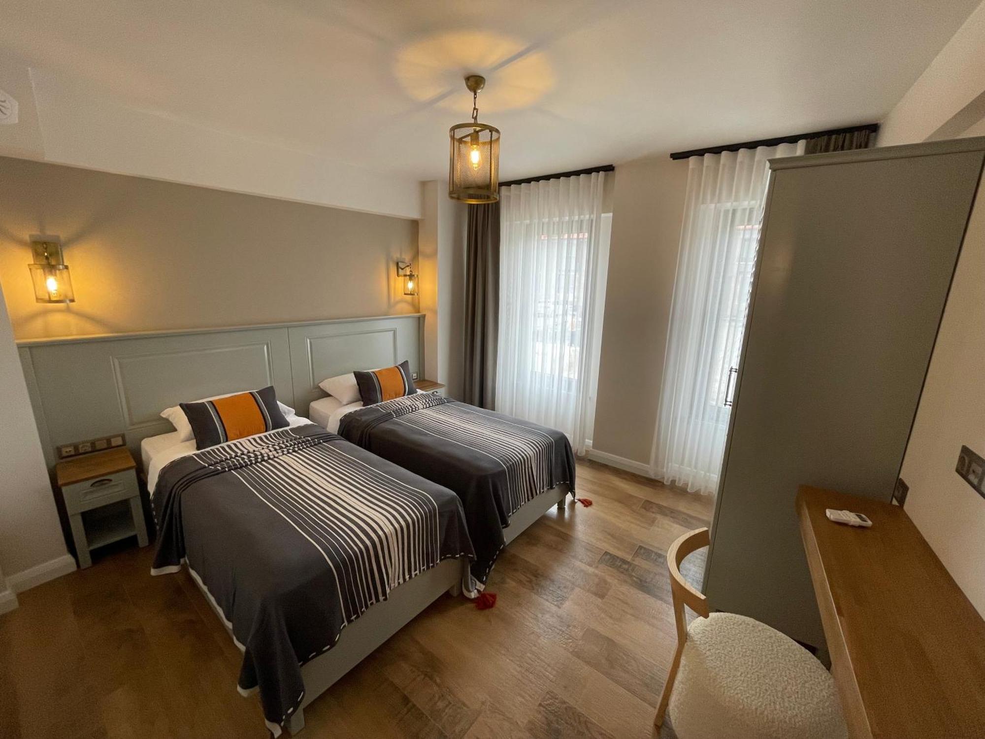 Oikos Bozcaada Aparthotel Rum bild