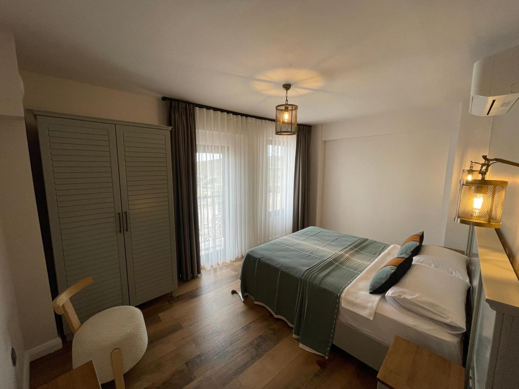 Oikos Bozcaada Aparthotel Rum bild